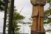 Next Image: Wood statue of Alexander Henry, and Mackinac Bridge