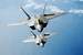 Next Image: F-22 Raptors in formation