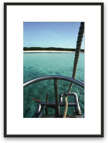 View of deserted beach from the sailboat Framed Fine Art Print