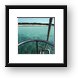 View of deserted beach from the sailboat Framed Print
