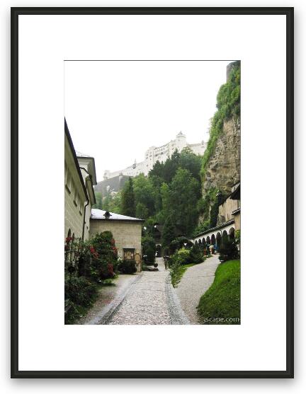 Cobblestone street with Hohensalzburg Fortress Framed Fine Art Print