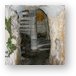Stairs to tower built into rock Metal Print