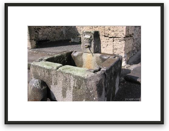 Typical water fountain in street Framed Fine Art Print