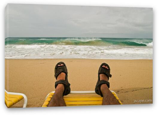 Adam relaxing and watching the waves Fine Art Canvas Print
