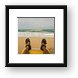 Adam relaxing and watching the waves Framed Print