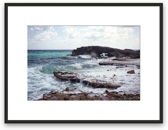 The Atlantic side of Cozumel is rocky with many natural bridges Framed Fine Art Print