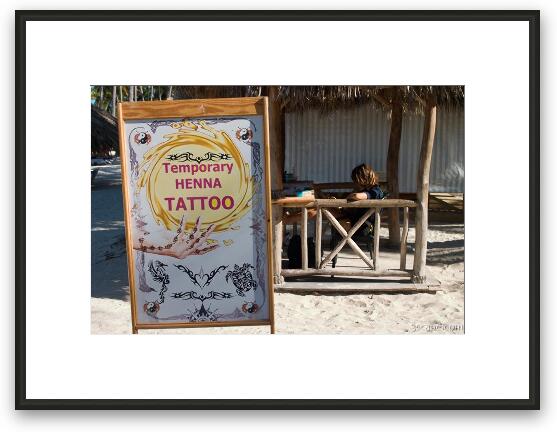 Temporary tattoos right on the beach! Framed Fine Art Print
