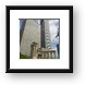 Prudential and Aon Buildings and Greek columns near Millenium Park Framed Print