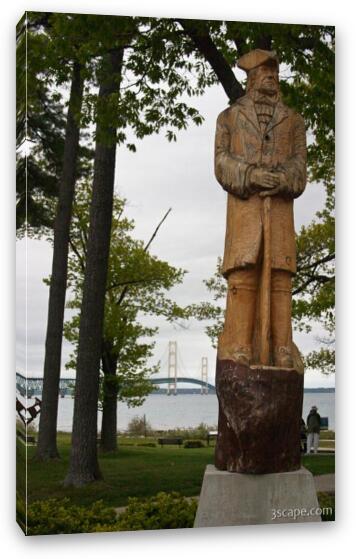 Wood statue of Alexander Henry, and Mackinac Bridge Fine Art Canvas Print