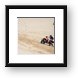 Quad ATV riding in dunes Framed Print