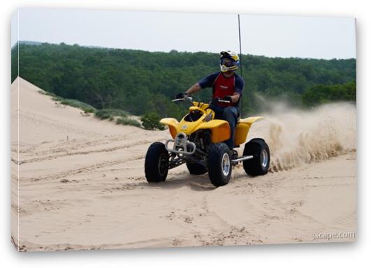 Quad ATV riding in dunes Fine Art Canvas Print