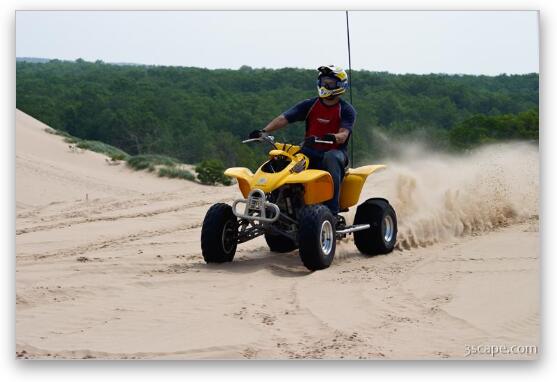 Quad ATV riding in dunes Fine Art Metal Print