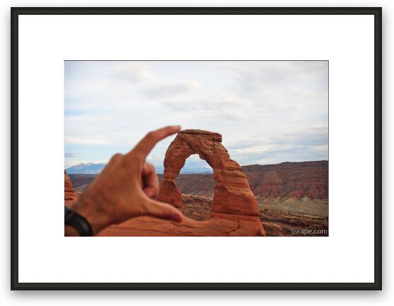 Squishing Delicate Arch Framed Fine Art Print