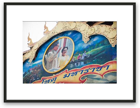 The king and queen, shown in an archway over the main street Framed Fine Art Print
