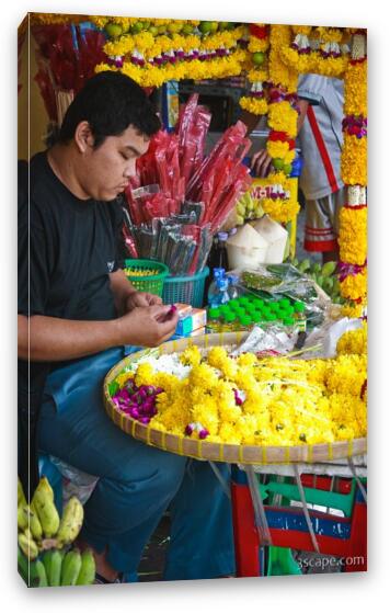 Street vendor making offerings for the temple Fine Art Canvas Print