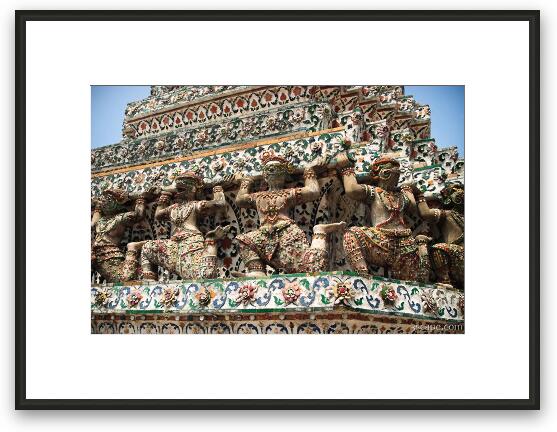 Khon figures holding up Wat Arun Framed Fine Art Print