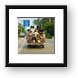About 15 workers piled into the back of a pickup Framed Print