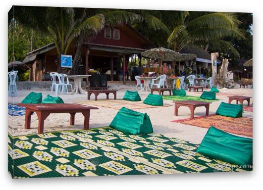 Resorts had their comfortable blankets set out all over the beach Fine Art Canvas Print