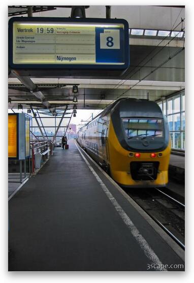 Intercity train pulling into Amsterdam Central station Fine Art Metal Print