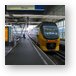 Intercity train pulling into Amsterdam Central station Metal Print