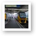 Intercity train pulling into Amsterdam Central station Art Print