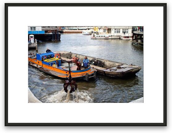 Garbage picker and barge grabbing bikes from the canal Framed Fine Art Print