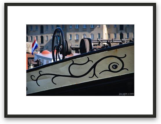Ship hull art and what may be the anchor hoist Framed Fine Art Print