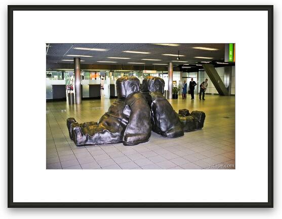 Metal sack-man art at Schiphol Airport Framed Fine Art Print