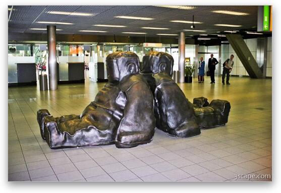 Metal sack-man art at Schiphol Airport Fine Art Metal Print