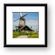 Bicycle riding and windmills Framed Print