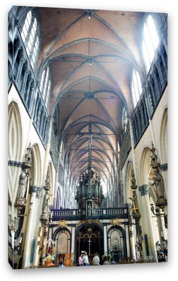 Light pouring into the windows of this huge cathedral Fine Art Canvas Print