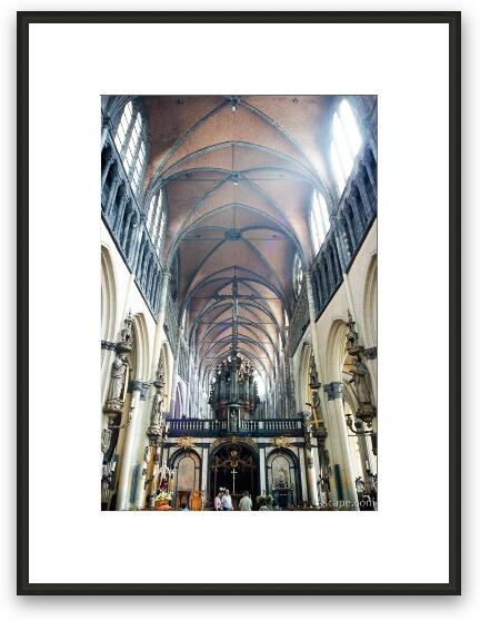 Light pouring into the windows of this huge cathedral Framed Fine Art Print