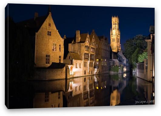 Medieval buildings and Belfry reflecting in the River Dijver Fine Art Canvas Print