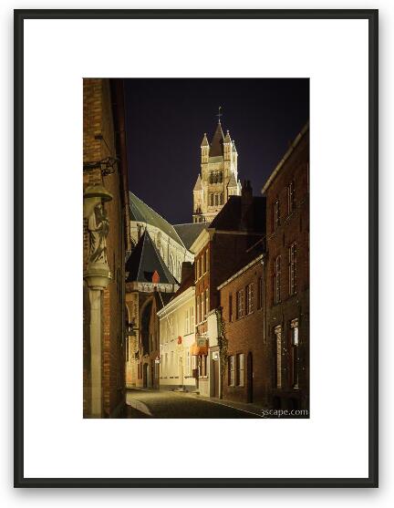 Narrow illuminated street and St Saviour Cathedral Framed Fine Art Print