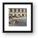 Little boy playing in the fountain Framed Print