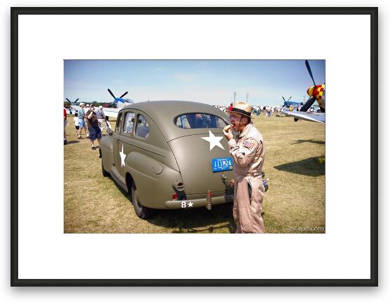 Donut eating pilot and old military vehicle Framed Fine Art Print