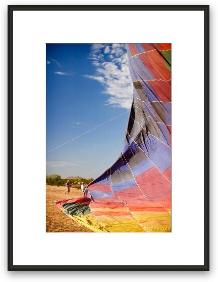 All done - the balloon is getting folded back up Framed Fine Art Print