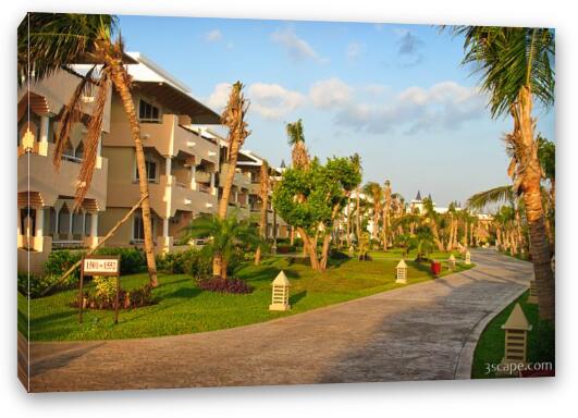 Walkway and room buildings at the Iberostar Fine Art Canvas Print