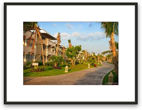Walkway and room buildings at the Iberostar Framed Fine Art Print