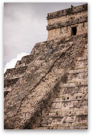 Worker climbing up the ruined side of El Castillo Fine Art Metal Print