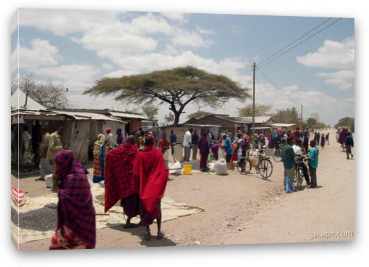 Maasai people and locals in a small town near Arusha Fine Art Canvas Print