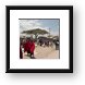 Maasai people and locals in a small town near Arusha Framed Print