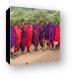 Group of Maasai men prepping for a welcome song and dance Canvas Print