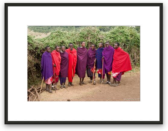 Group of Maasai men prepping for a welcome song and dance Framed Fine Art Print