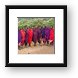 Group of Maasai men prepping for a welcome song and dance Framed Print