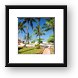 The beach and palm trees at the resort Framed Print