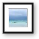 Boats and an approaching storm Framed Print