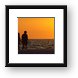 Couple taking a romantic walk on the beach Framed Print