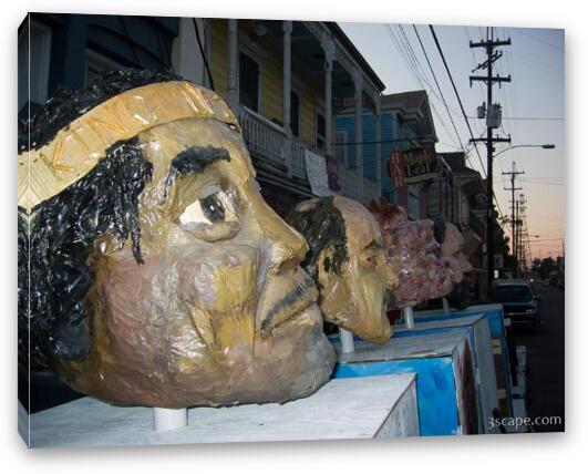Giant heads waiting for the parade Fine Art Canvas Print