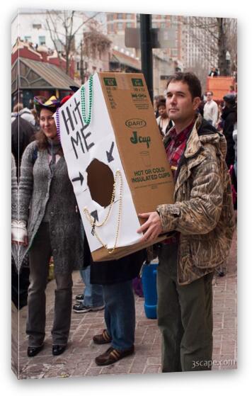 Guy holding a box for catching beads Fine Art Canvas Print